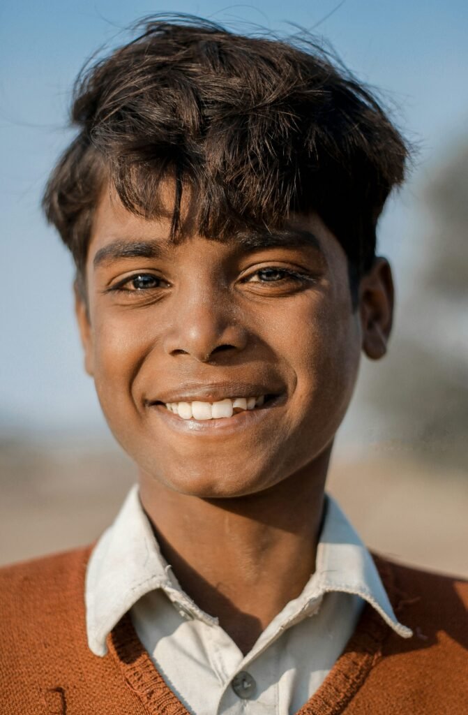 A young boy with a smile on his face