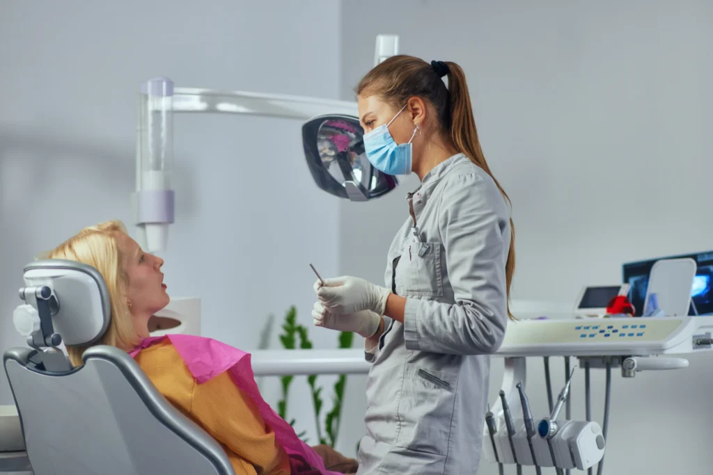 Dentist and patient at clinic 2023 02 09 01 29 13 utc