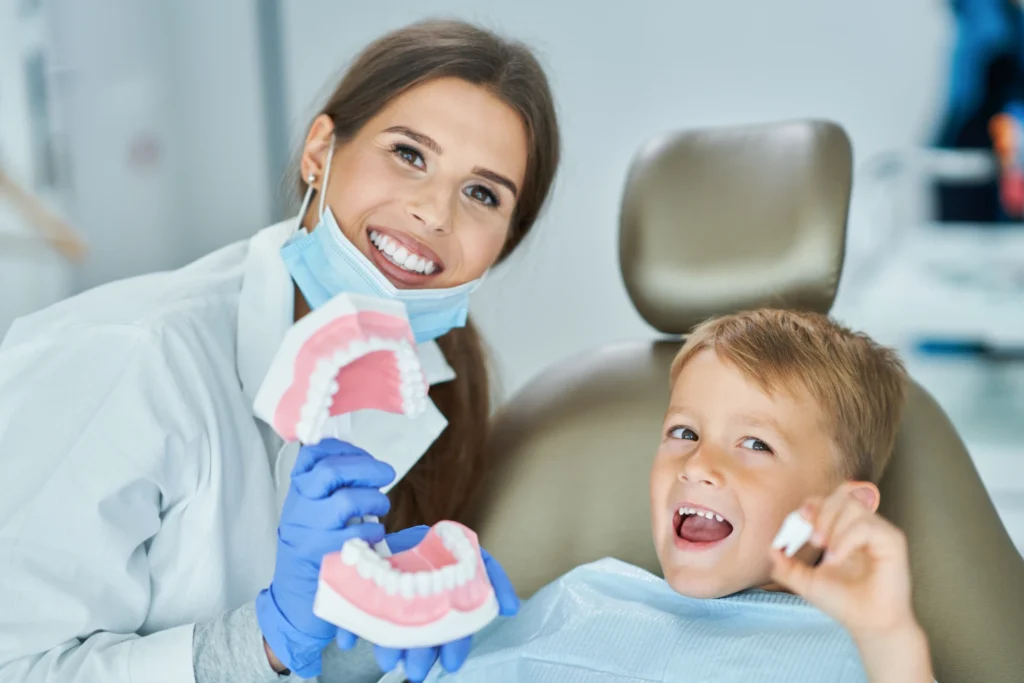 Little boy and female dentist in the dentists offi 2022 05 13 01 30 18 utc